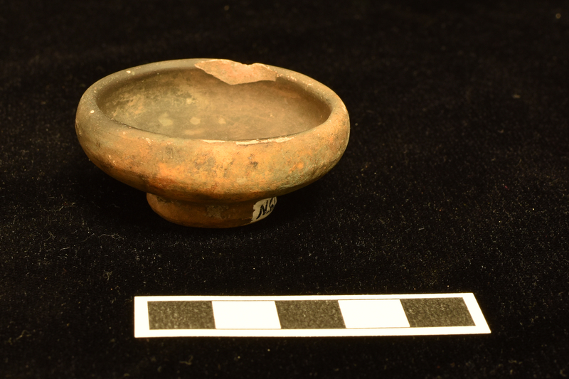 Shallow bowl w fairly tall incurving rim on ring base.  Completely coated inside and out, excluding underside of base.