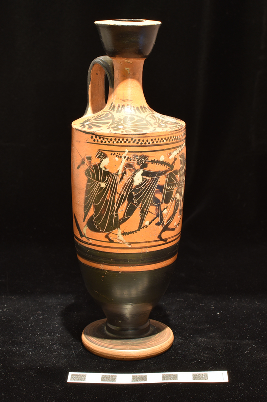 Trumpet -mouthed lekythos with main scene "Rape of Tripod": in center Apollo at left and Heracles with raised club at right struggling for tripod in center, flanked by Artemis at left running right and Athena at right running right looking back; figures decorated with incision and added white.  Main zone defined above and below by two narrow stripes with band of red and white dots on reserve ground above and broad stripe below;   lower body, top of base and interior foot, except for reserve center solidly coated; Shoulder decorated with horizontal palmettes with single white dot in base of each with band of short h stripes above; exterior of handle and exterior and interior of mouth solidly coated.
